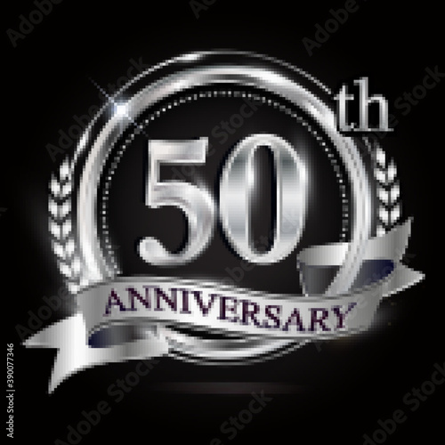 Celebrating 50th anniversary logo, with silver ring and ribbon.