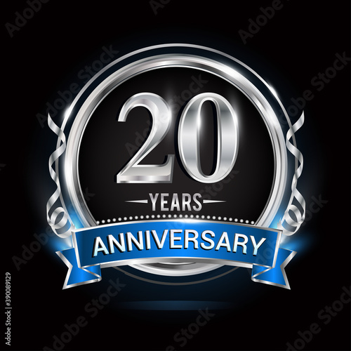 Logo celebrating 20th years anniversary with silver ring and blue ribbon.