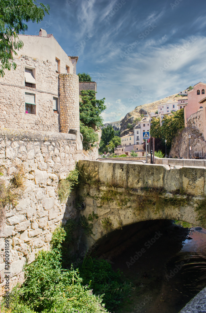 Stone bridge over the Huecar river as it passes through the city of Cuenca