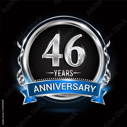 Logo celebrating 46th years anniversary with silver ring and blue ribbon.