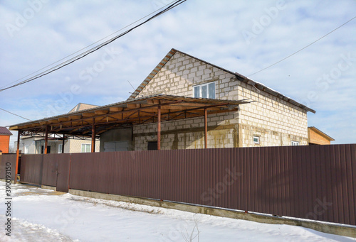Foam block house under construction in winter.