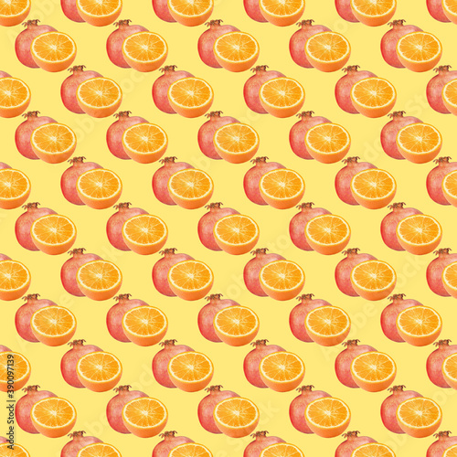 Seamless pattern, tropical fruits pomegranate and orange on a yellow background.