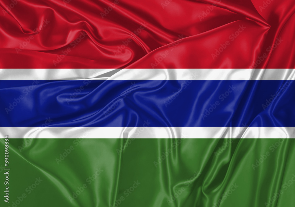 Gambia flag waving in the wind. National flag on satin cloth surface texture. Background for international concept.