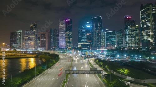 SINGAPORE - FEBRUARY 2: Hyper lapse video 4K, Aerial view traffic with background Singapore landmark financial business district with skyscraper, traffic into city on February 2, 2020 in Singapore.