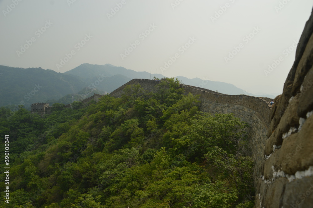 Hiking in the beautiful Chinese mountain landscapes and on the ancient historical Great Wall of China 