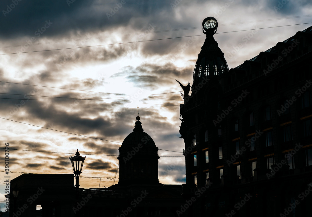 outline of the building and dome of the Cathedral and a lantern against the sky with clouds at sunset in St. Petersburg outline of the building and dome of the Cathedral and a lantern against the sky with clouds at sunset in St. Petersburg