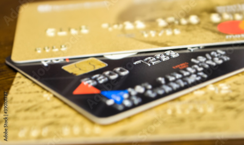 Close-up of a three credit cards located on a table 