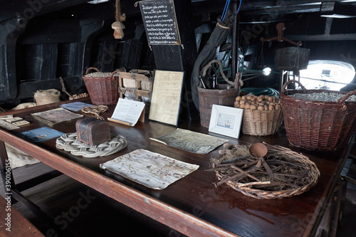 Fototapeta Naklejka Na Ścianę i Meble -  Old wooden ship pantry with food and chest