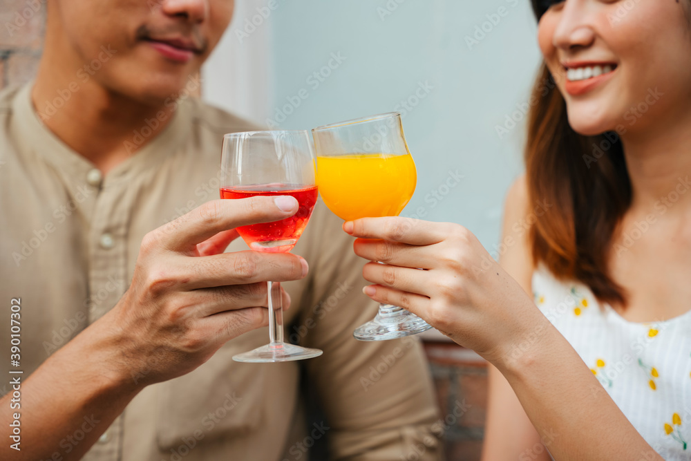 Asian couple celebrate party toasting wine glass at cafe restaurant. Asian couple celebrate party toasting wine glass at cafe restaurant.