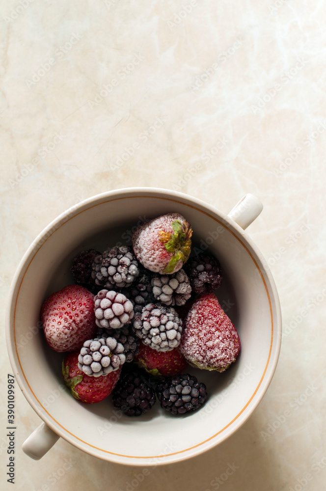Frozen red fruits. Strawberries and blackberries Frozen red fruits. Strawberries and blackberries