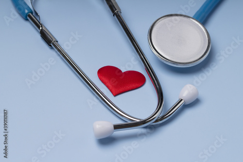 Stethoscope with red heart. medical concept.
