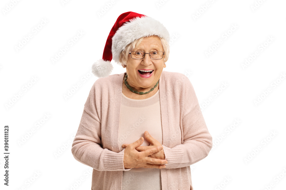 Happy elderly woman with a santa claus hat laughing Happy elderly woman with a santa claus hat laughing
