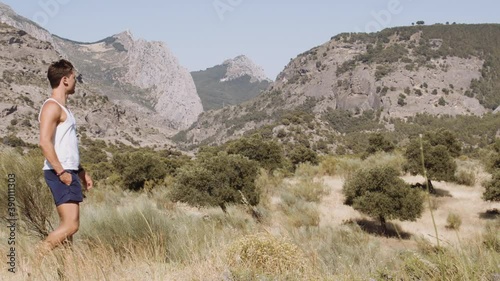 Handsome Guy Filming In El Chorro With Smartphone