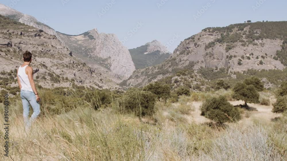 Handsome Man Using Smartphone In Landscape Handsome Man Using Smartphone In Landscape