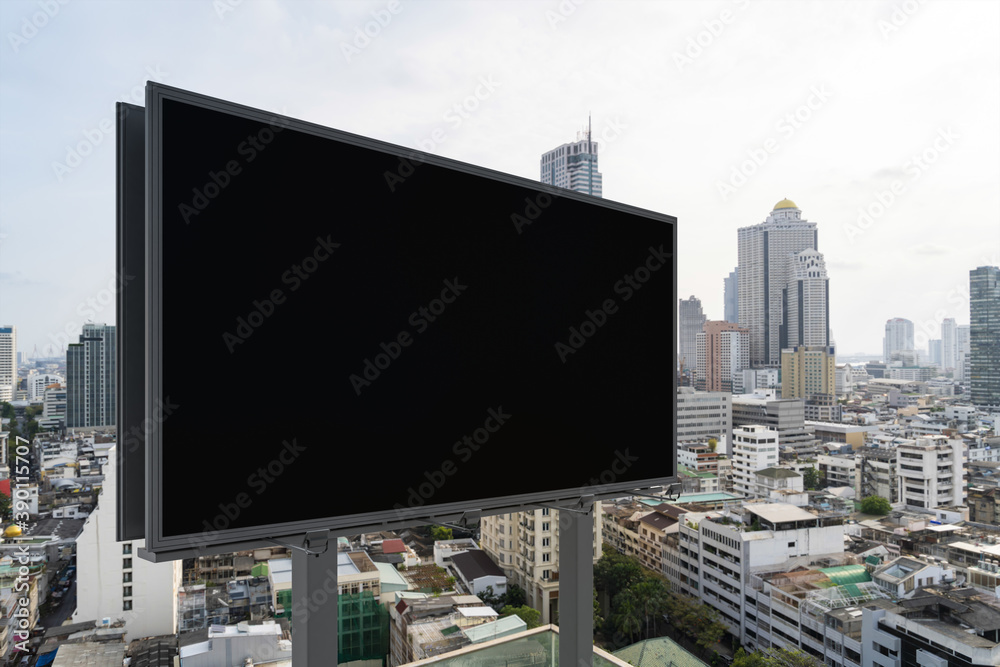Blank black road billboard with Bangkok cityscape background at day time. Street advertising poster, mock up, 3D rendering. Side view. The concept of marketing communication to promote or sell idea. Blank black road billboard with Bangkok cityscape background at day time. Street advertising poster, mock up, 3D rendering. Side view. The concept of marketing communication to promote or sell idea.