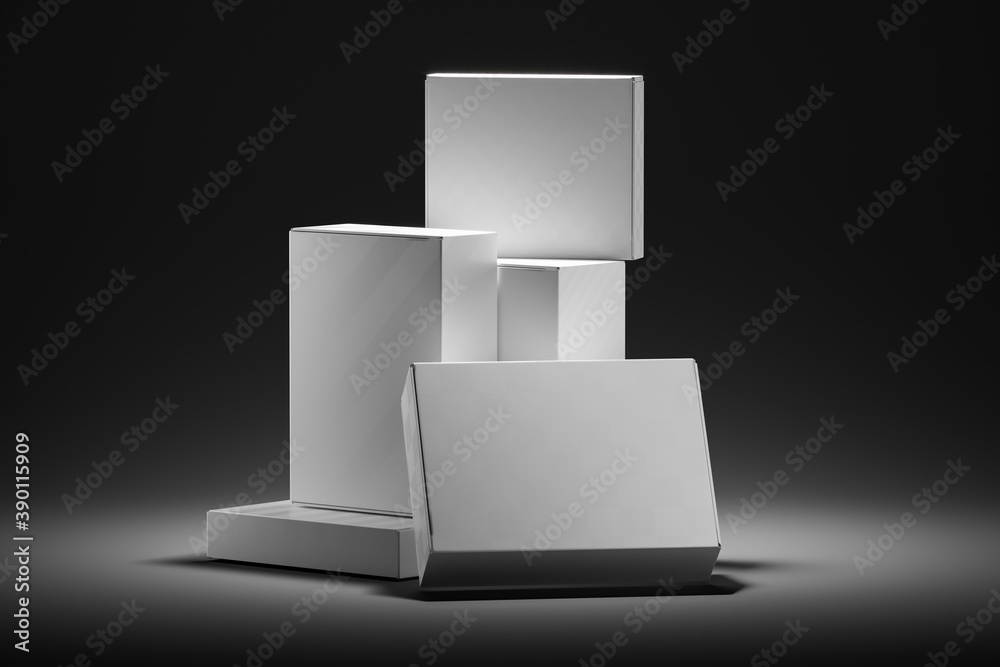 Set of White Blank Boxes Made From Recycled Cardboard Illuminated With Spotligh on Black Background. 3d Rendering Set of White Blank Boxes Made From Recycled Cardboard Illuminated With Spotligh on Black Background. 3d Rendering