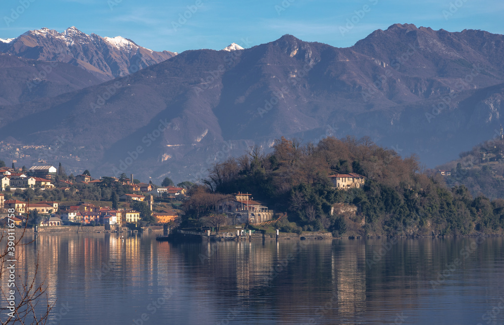 bright view of Comacina island in a sunny day.Como lake, Lombardy, Italy