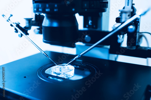 Equipment on laboratory of Fertilization, IVF. Microscope of reproductive medicine clinic fertilizing egg outside female body. Disease laboratory research photo