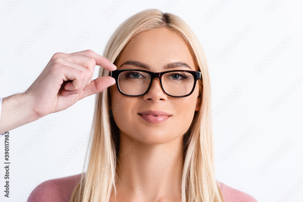 Ophthalmologist holding eyeglasses frame of blonde woman isolated on white Ophthalmologist holding eyeglasses frame of blonde woman isolated on white