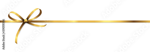 golden colored ribbon bow photo