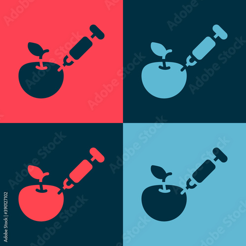 Pop art Genetically modified apple icon isolated on color background. GMO fruit. Syringe being injected to apple. Vector.