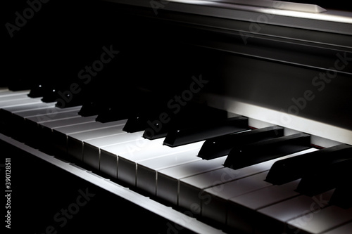 closeup of the keyboard of a piano