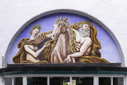 PORTMEIRION, UNITED KINGDOM - Feb 22, 2019: Wall art in the village of Portmeirion photo