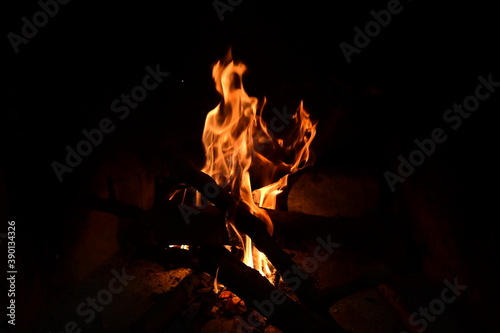 firewood's burn in a fire-place a fire