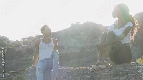 Tourist Couple Under Sunlight In Spain