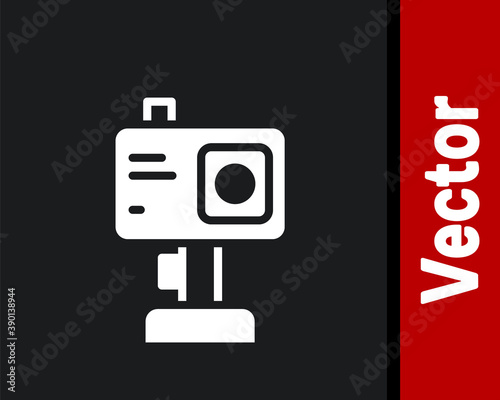 White Action extreme camera icon isolated on black background. Video camera equipment for filming extreme sports. Vector.