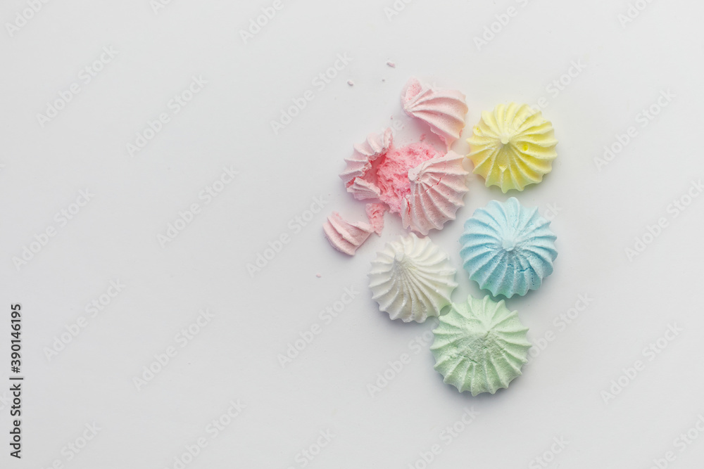 Pastel colored meringue on white background Pastel colored meringue on white background