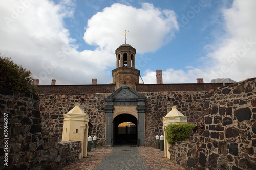 View of Gateway to the Castle of Good Hope under blue sky in Cape Town, South Africa. 