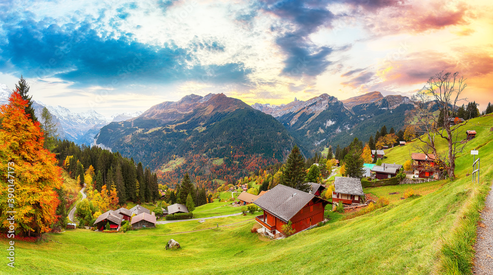 Gorgeous panorama over picturesque alpine village Wengen at autumn.