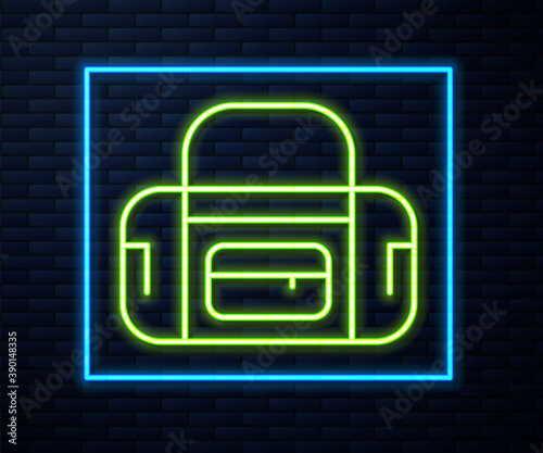 Glowing neon line Sport bag icon isolated on brick wall background. Vector.