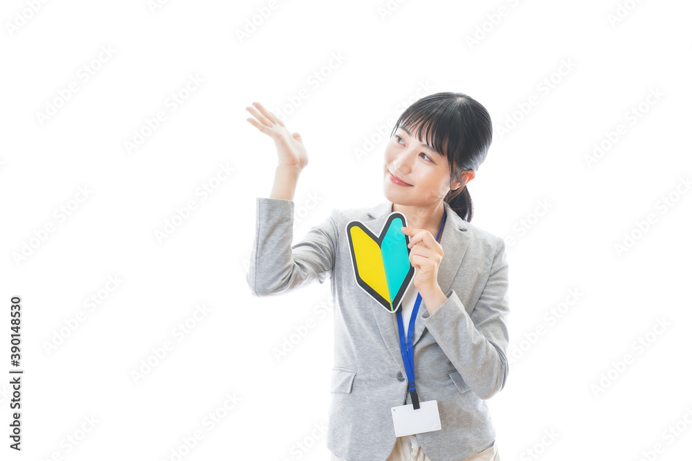 初心者マークを持つ若いビジネスパーソン