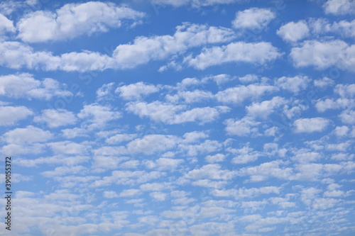 cumulus clouds against blue sky