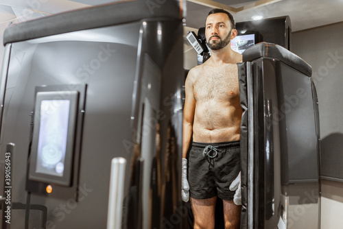 Man taking cryotherapy treatment photo