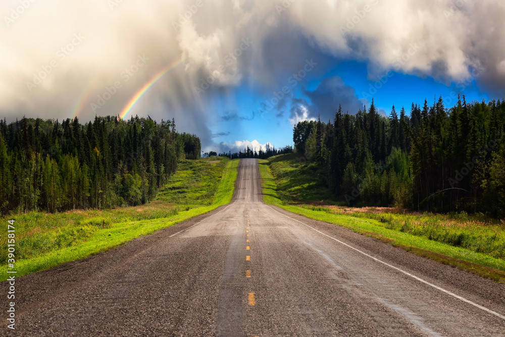 Beautiful View of a scenic road, Alaska Hwy, in the Northern Rockies. Dramatic Rainy Clouds with Rainbow Artistic Render. Taken in British Columbia, Canada. Nature Background Panorama Beautiful View of a scenic road, Alaska Hwy, in the Northern Rockies. Dramatic Rainy Clouds with Rainbow Artistic Render. Taken in British Columbia, Canada. Nature Background Panorama