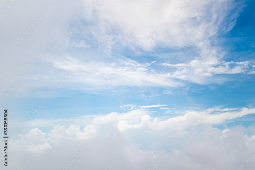 White fluffy cloud on blue sky background.