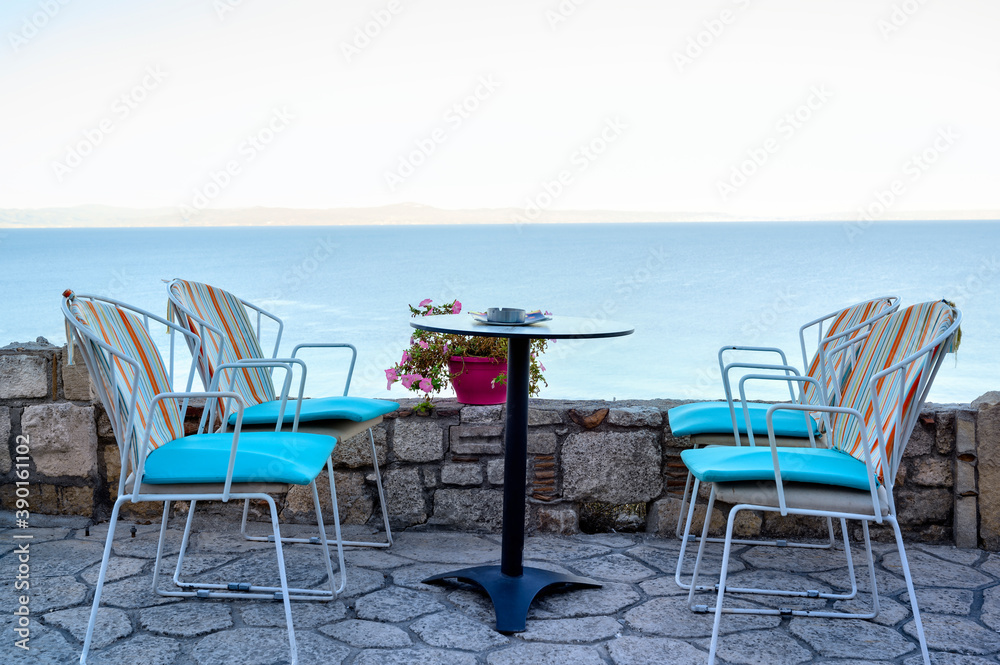 Empty restaurant terrace table in Afitos, Halkidiki, Greece