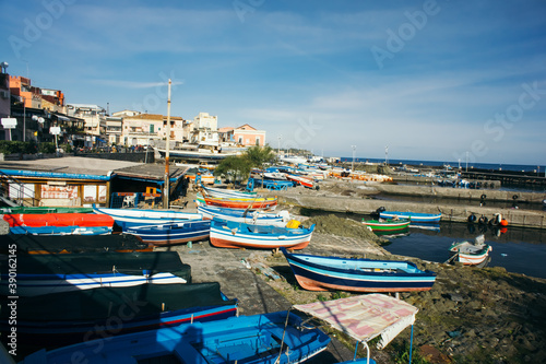 Aci Trezza, Italy, 04 January 2019: a picturesque marina with fishing boats in Aci Trezza, Sicily © Maria