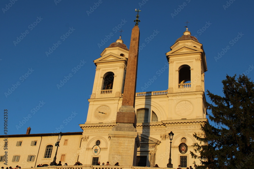 obelisk and bell tower at famous landmark spanish steps rome italy