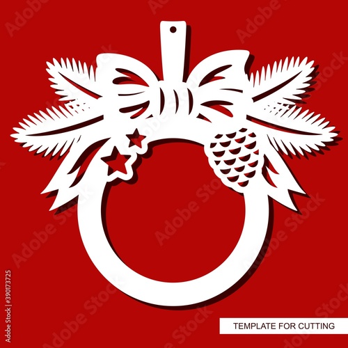 New Year or Christmas round photo frame. Decorate with spruce branches, a pine cone, a bow, stars. Vector layout for plotter laser cutting of paper, plastic, plywood, wood carving, metal engraving.