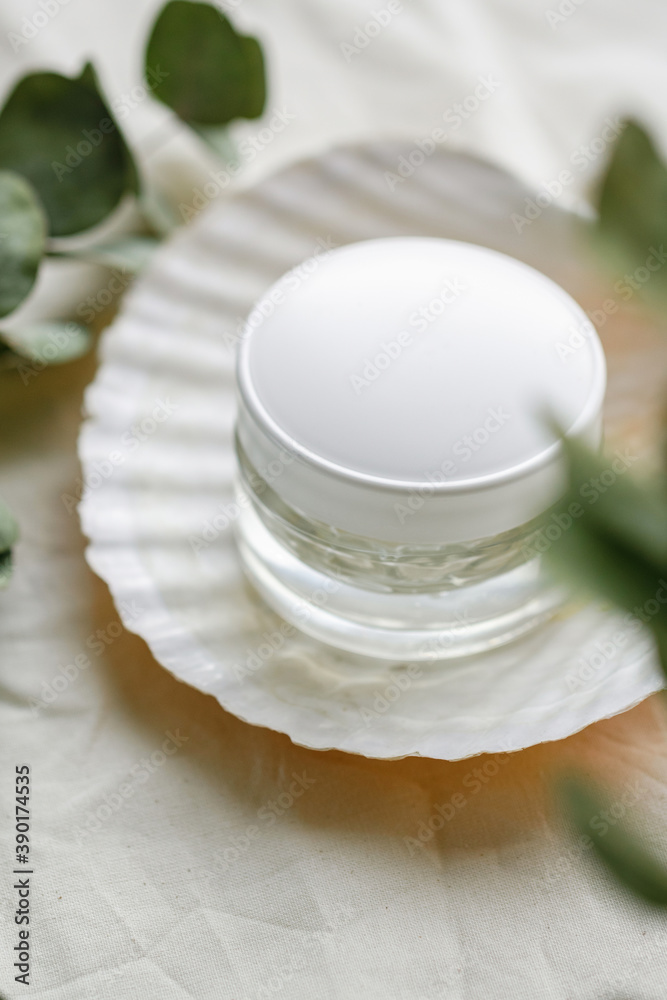 white cosmetic container with cream in a shell white cosmetic container with cream in a shell