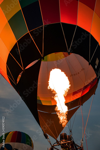 sending up a hot-air balloons in the evening 