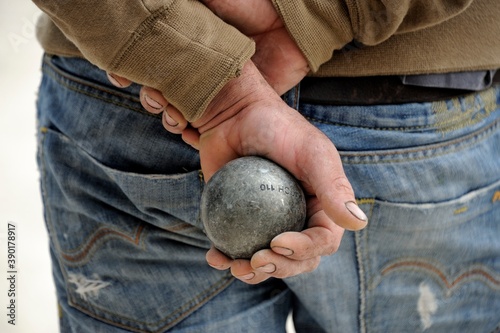 Playing jeu de boules in France, Europe photo