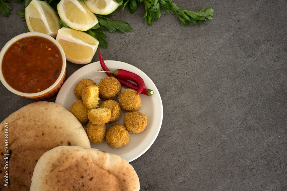 Falafel authentic food of Israel. Fresh ingredients top view plate