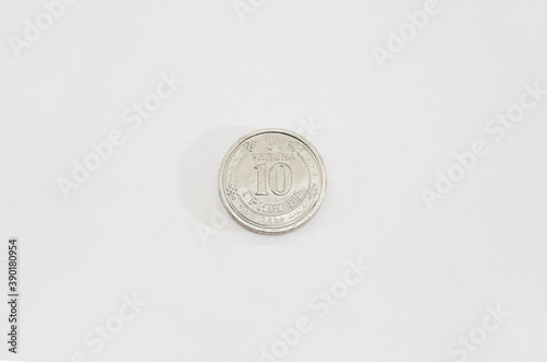 10 hryvnia coin on a white background. photo