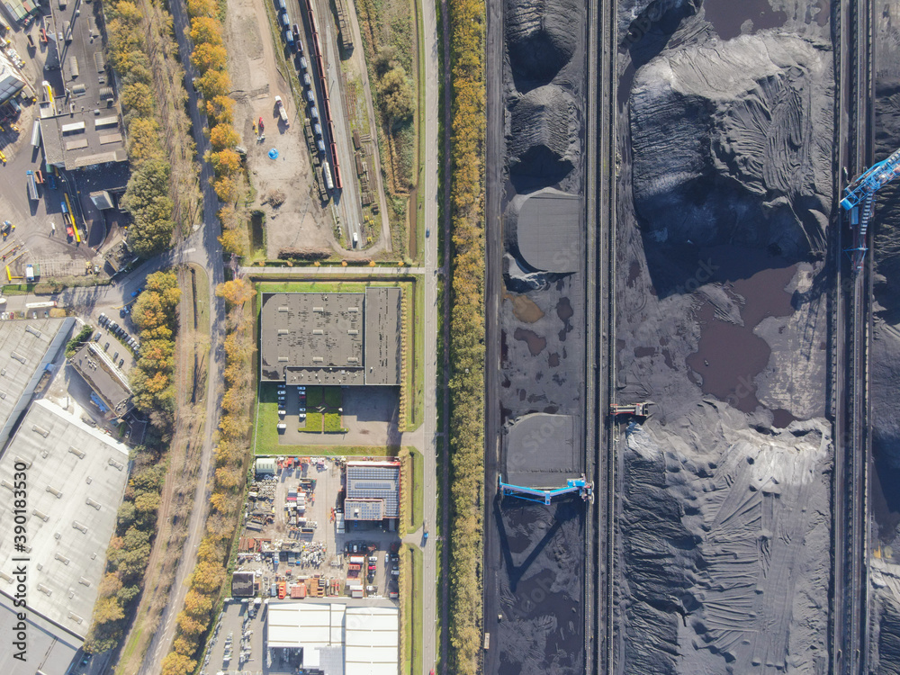 Fototapeta premium Coal storage place energy consumption piles of black coal