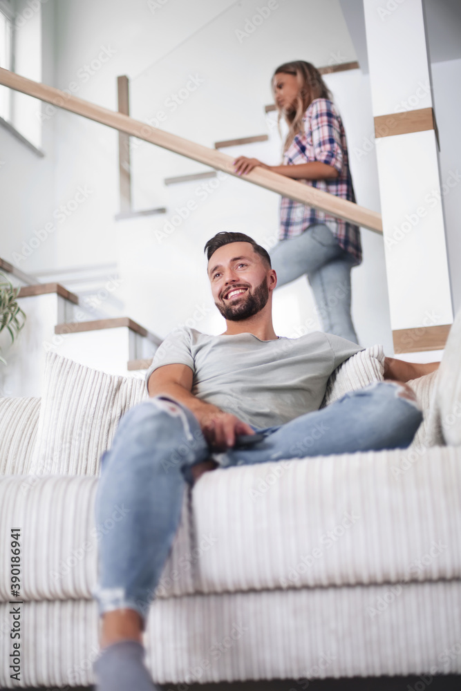 close up. young man sitting on sofa. close up. young man sitting on sofa.